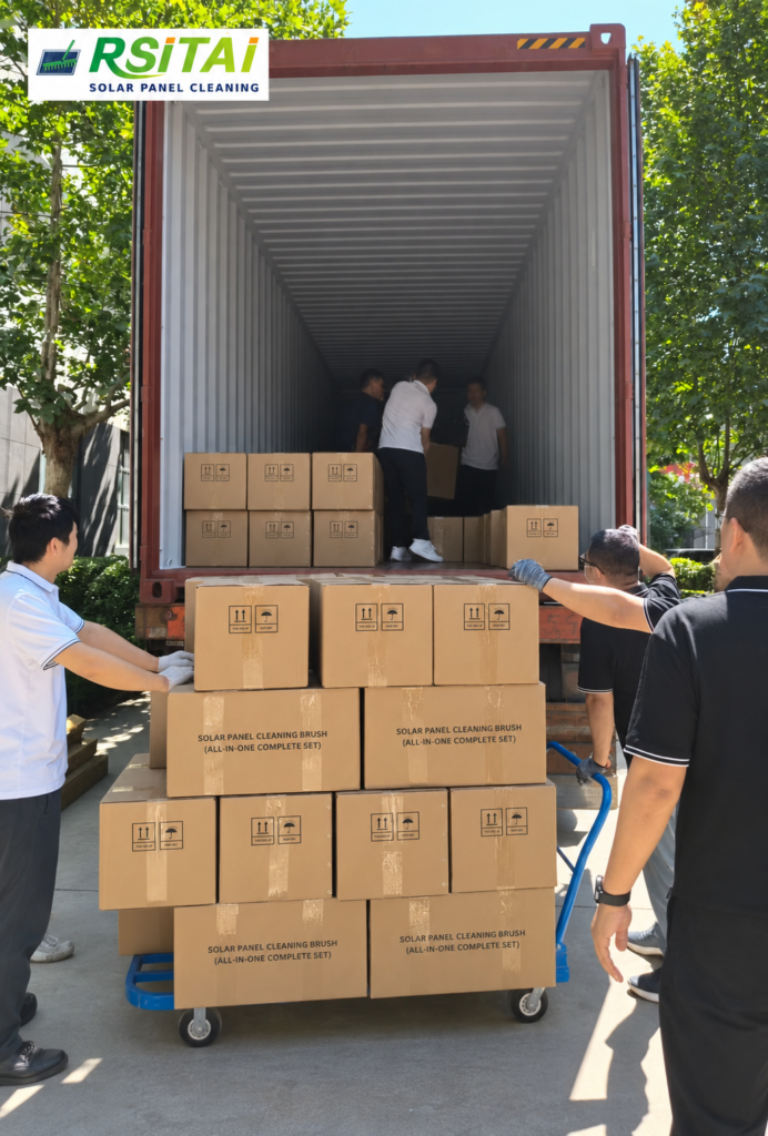 Cartons of solar panel cleaning brushes being loaded into a shipping container