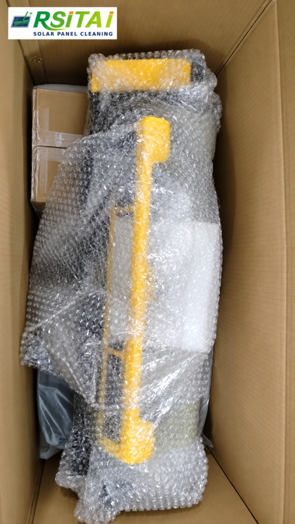 RSITAI solar panel roller brush protected with bubble wrap in a shipping carton